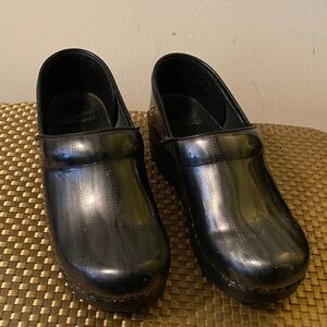 Dansko Shiny Black Women’s Slip-Ons